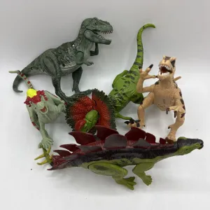 Bag of Assorted Jurassic World Dinosaur Noise Making Figurines